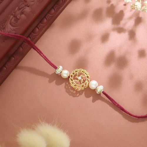 Malabar Gold Spiritual Swastik Two-in-One Rakhi and Pendant