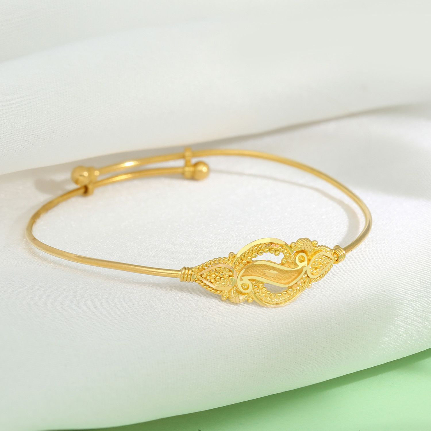 Sabona bangle gold clearance designs