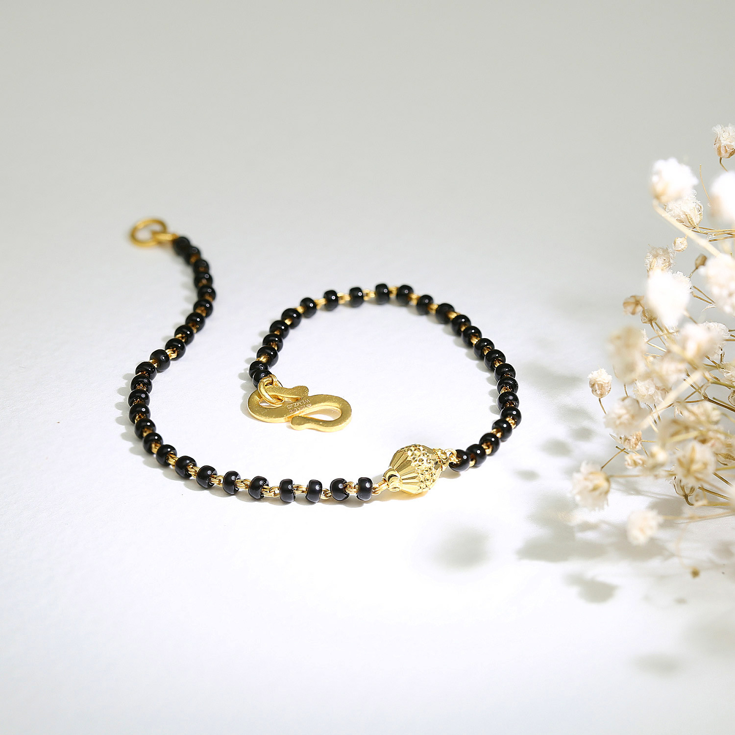 Mangalsutra bracelet in shop malabar gold