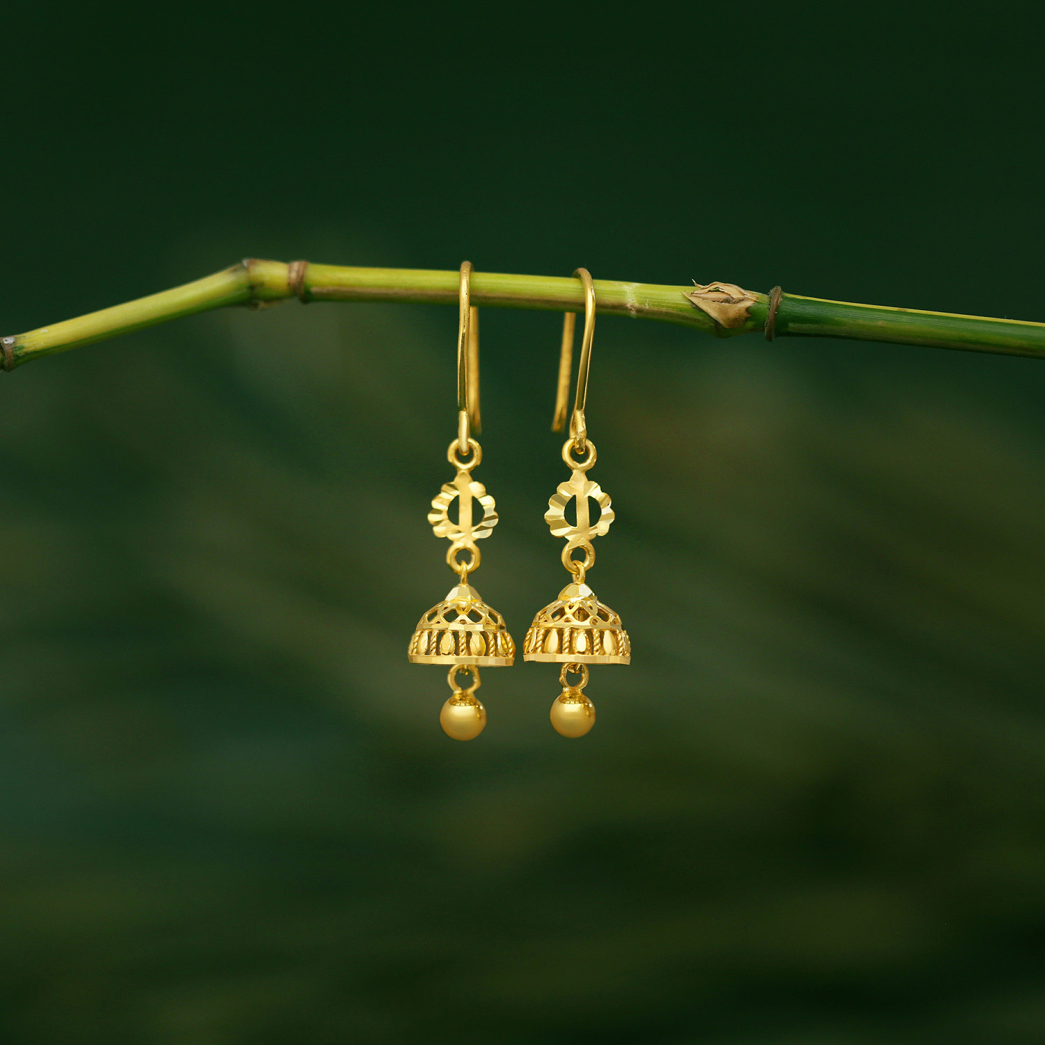 Gold jhumka earrings malabar online