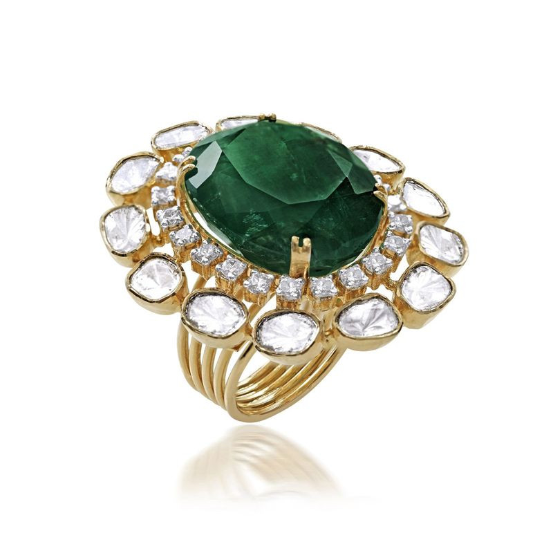 Malabar Gold and Diamonds - A traditional ear jewel studded with green  emerald stones. This special ear ring designed as jimikki form perfectly  created to enhance the beauty of women | Facebook