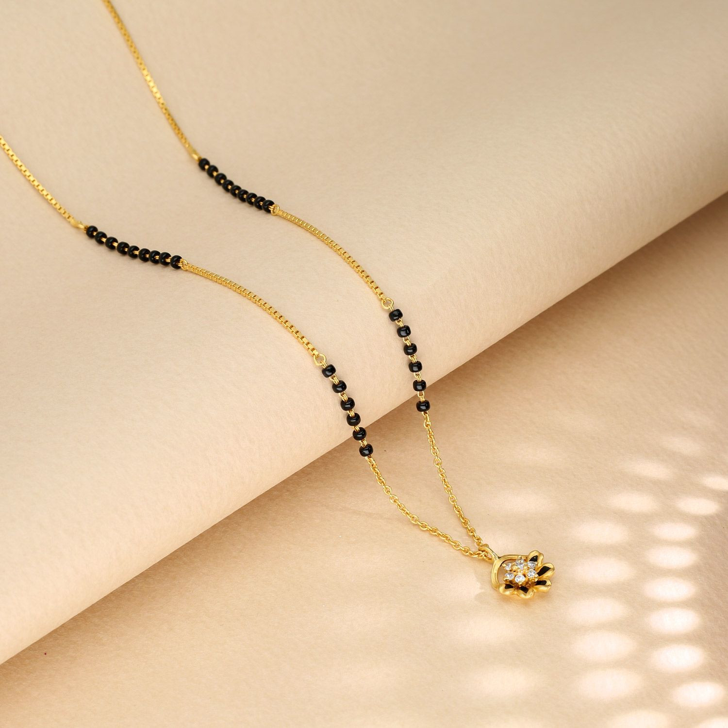 Short mangalsutra hotsell in malabar gold