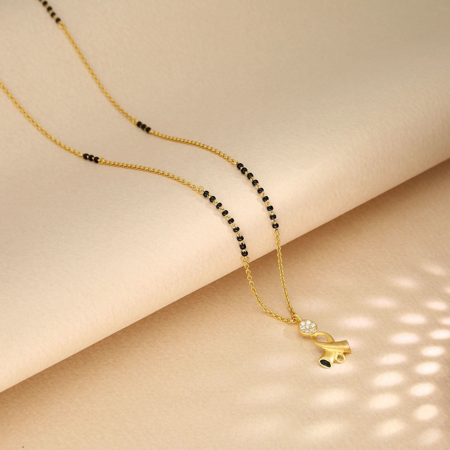 Short mangalsutra gold top