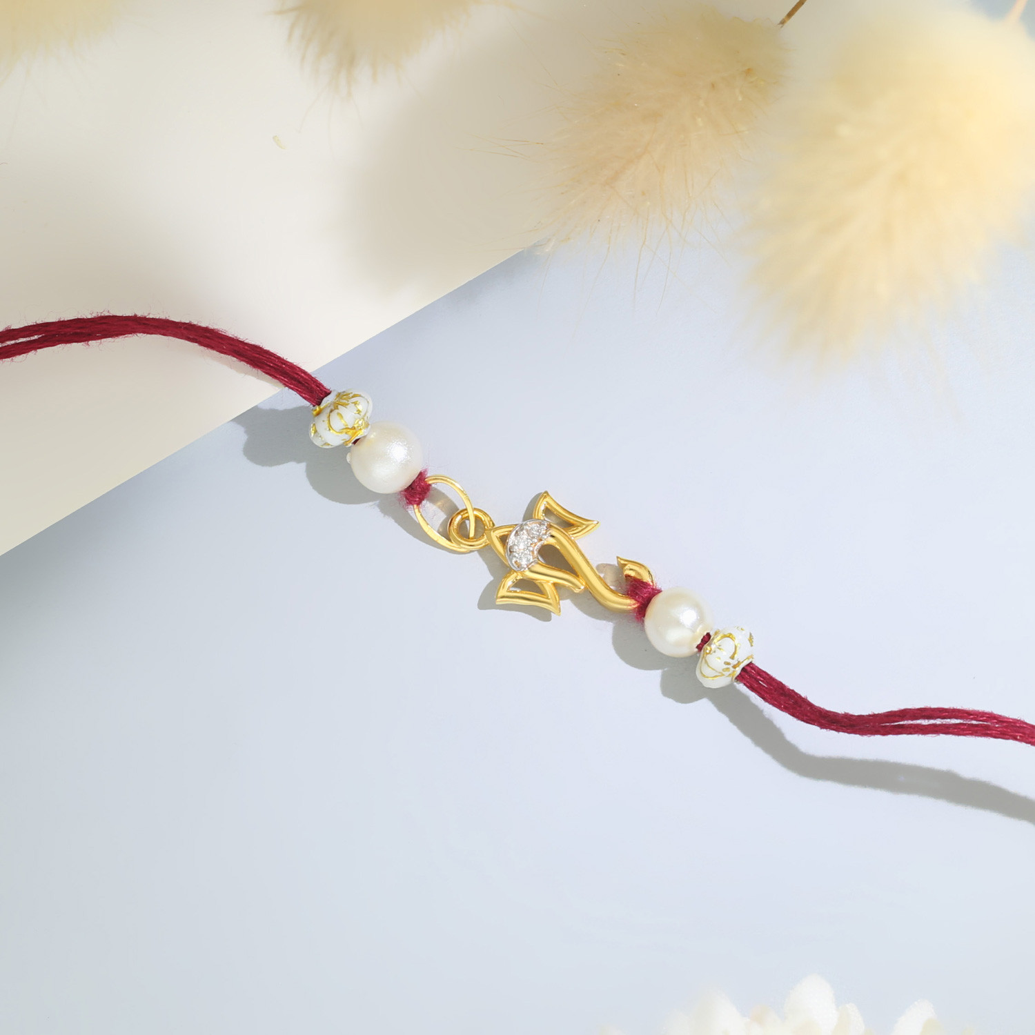 Malabar Gold Rakhi EKPDDZ0005RP_14KT