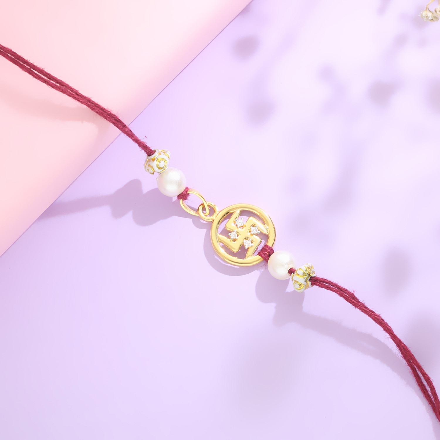 Malabar Gold Swastik Two-in-One Rakhi and Pendant