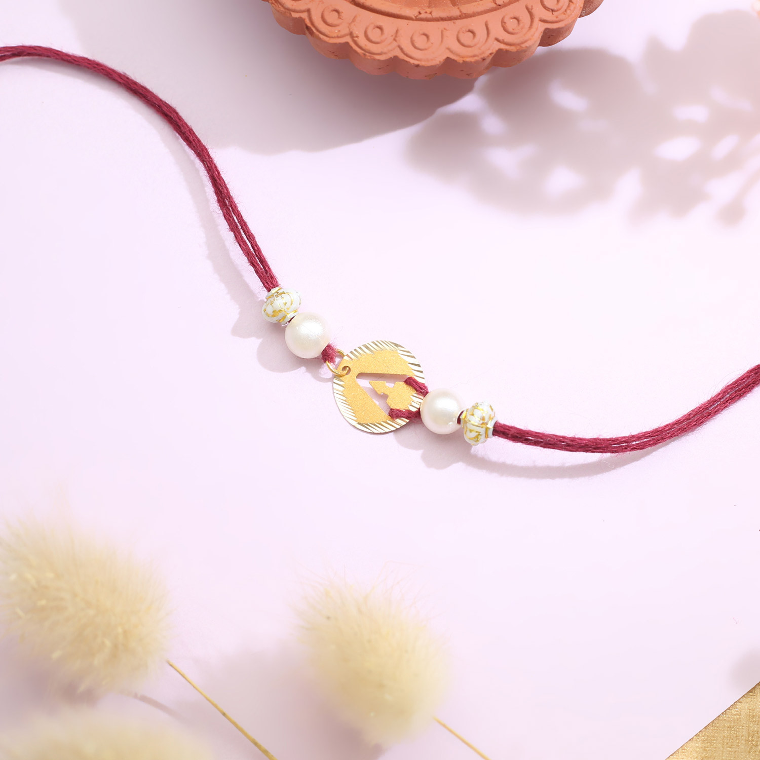 Malabar Gold Circle Motif A Alphabet Two-in-One Rakhi and Pendant