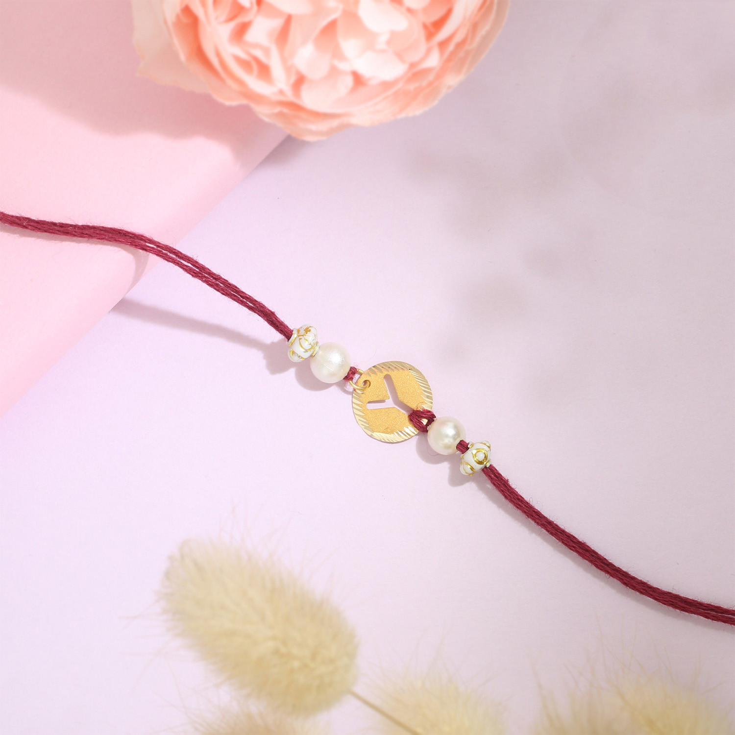 Malabar Gold Circle Motif Y Alphabet Two-in-One Rakhi and Pendant