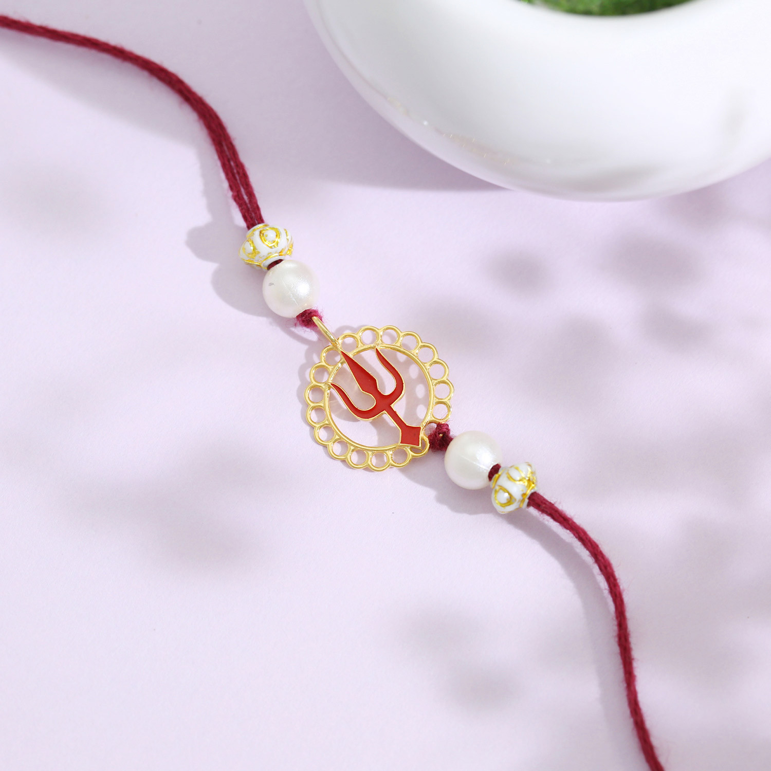 Malabar 14Kt Yellow Gold Trishul Two-in-One Rakhi and Pendant