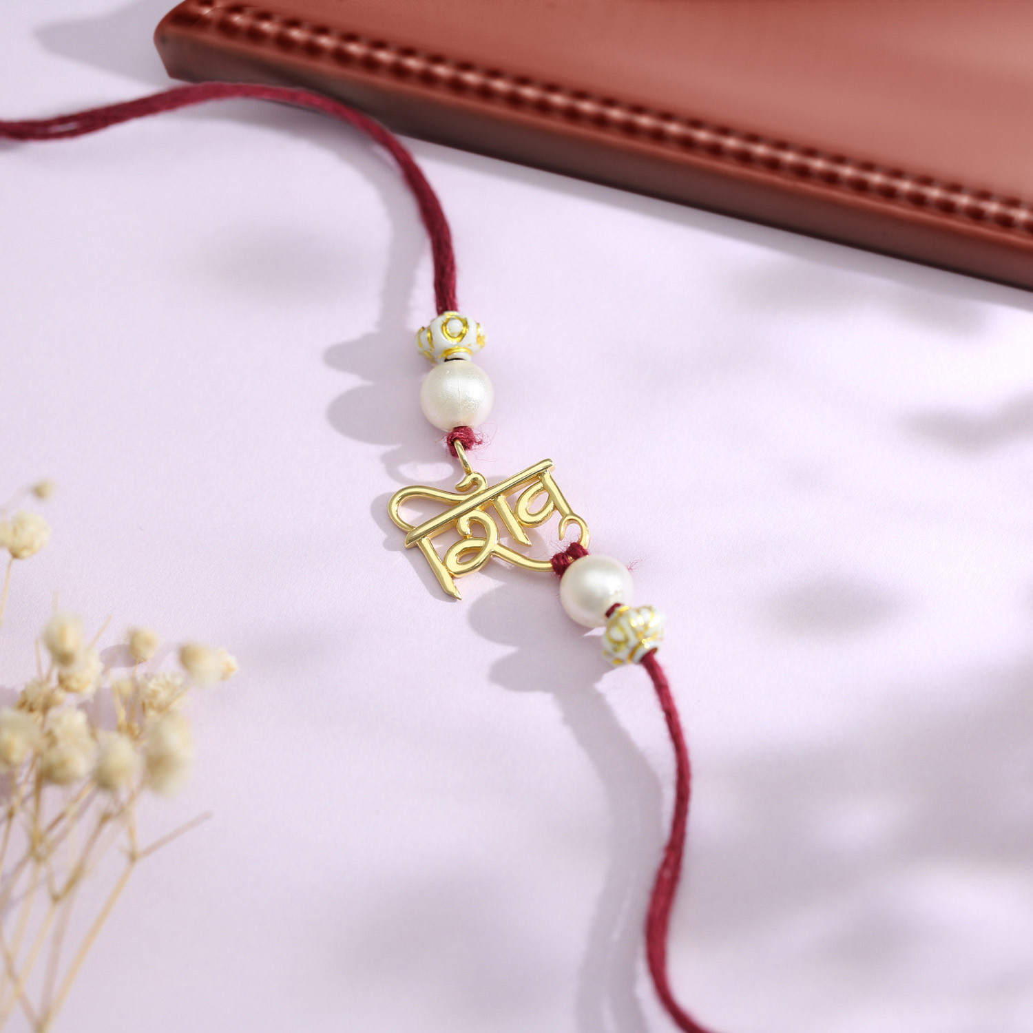 Malabar 14Kt Yellow Gold Shiv Two-in-One Rakhi and Pendant