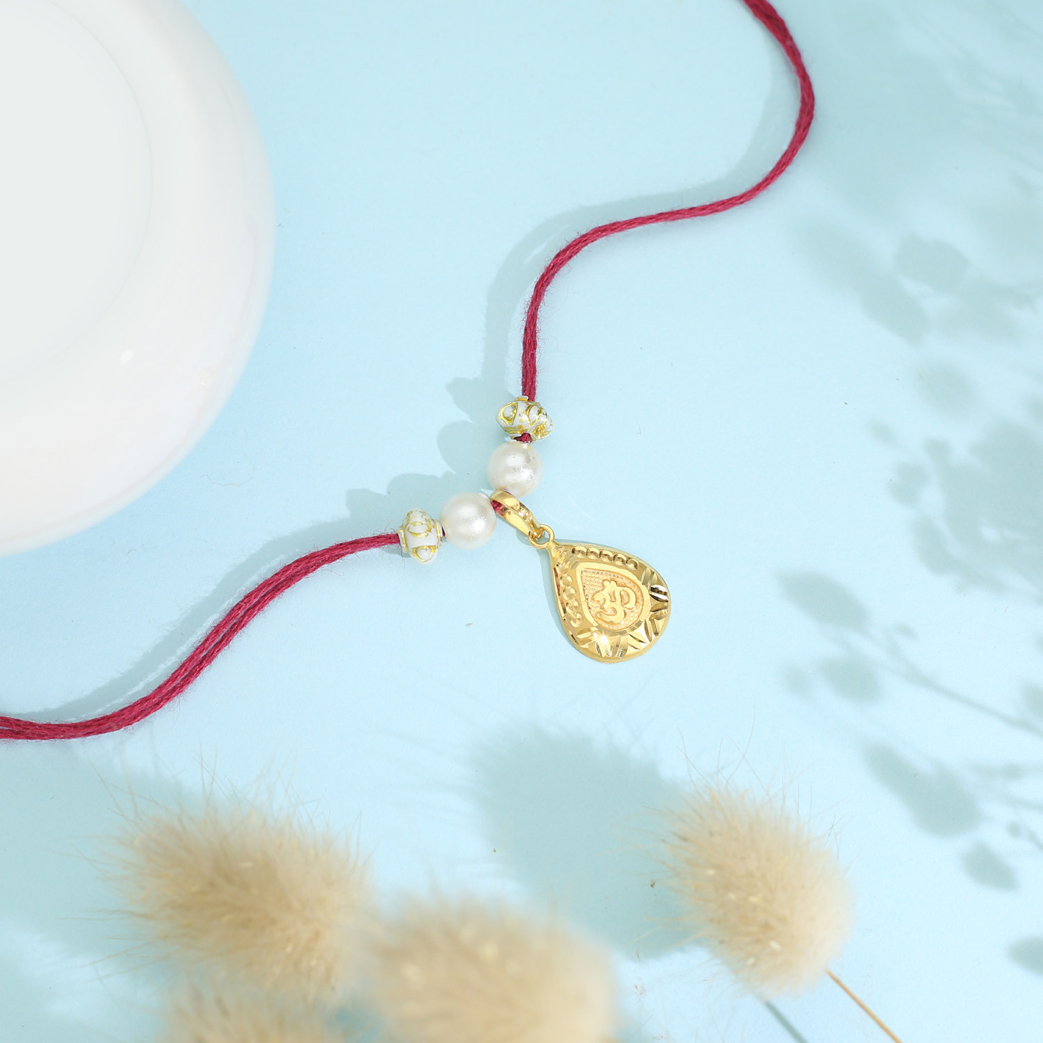 Malabar Gold Rakhi cum Pendant PDNOB40508R