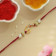 Malabar Gold Ganesha Two-in-One Rakhi and Pendant