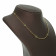 Precia Gemstone Studded Semi Long Gold Necklace NYM25