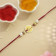 Malabar Gold Circle Motif J Alphabet Two-in-One Rakhi and Pendant