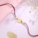 Malabar Gold Circle Motif Z Alphabet Two-in-One Rakhi and Pendant