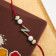 Malabar Gold Alphabet N Two-in-One Rakhi and Pendant