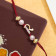 Malabar Gold Alphabet R Two-in-One Rakhi and Pendant