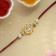 Malabar Gold Spiritual OM Two-in-One Rakhi and Pendant