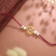 Malabar Gold Spiritual Swastik Two-in-One Rakhi and Pendant